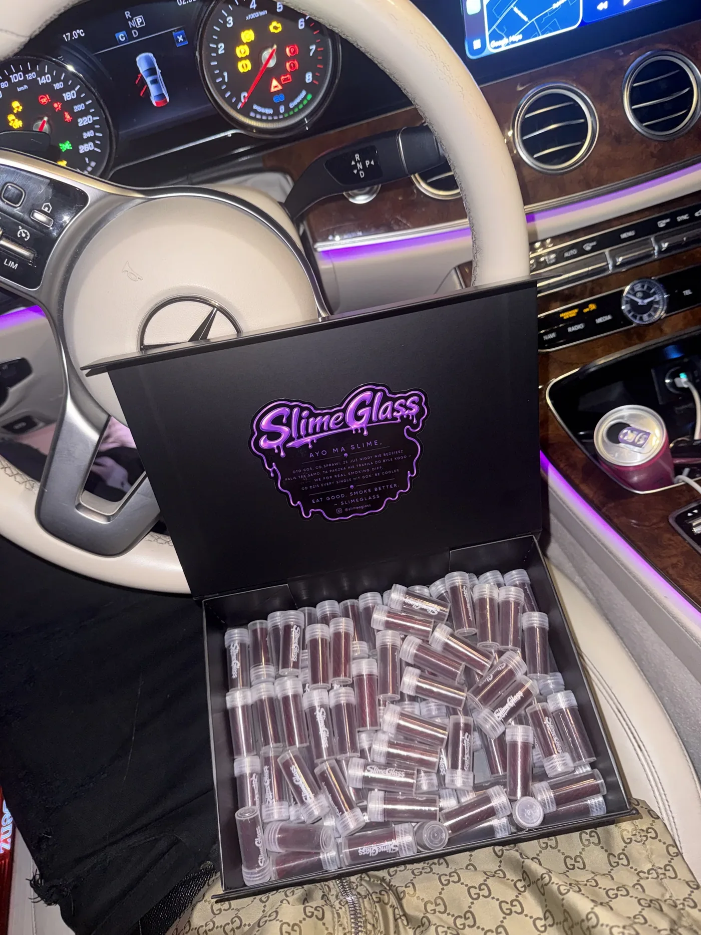 SlimeGlass box of red glass tips on a Mercedes steering wheel